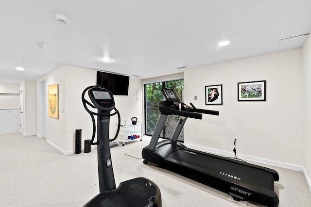 workout room featuring baseboards, carpet floors, and recessed lighting