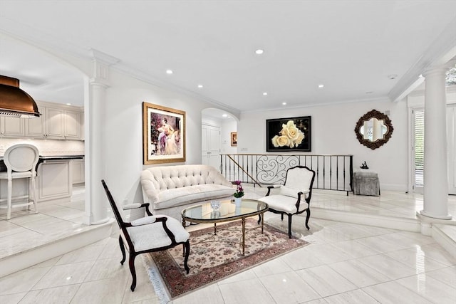 living room featuring ornate columns, ornamental molding, recessed lighting, light tile patterned floors, and baseboards