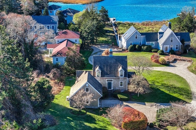 birds eye view of property featuring a water view