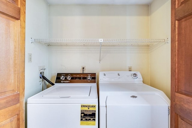 washroom featuring independent washer and dryer