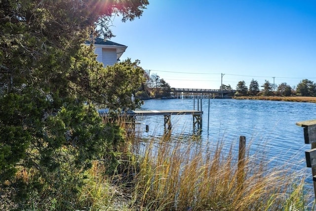 view of dock with a water view