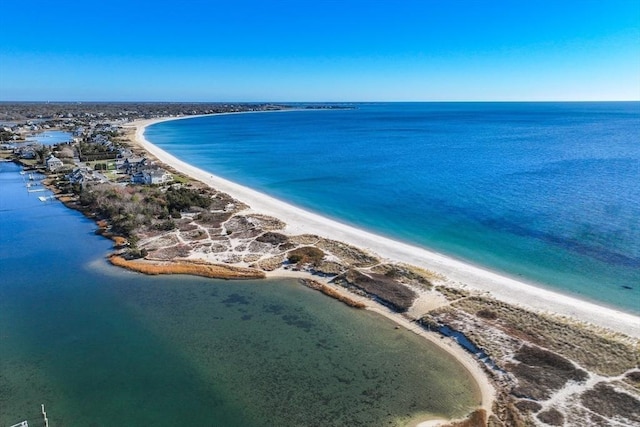 aerial view featuring a water view and a beach view