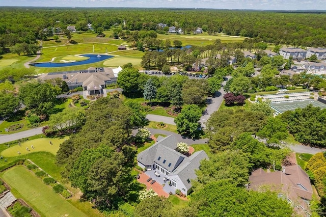 bird's eye view featuring a residential view, golf course view, and a forest view