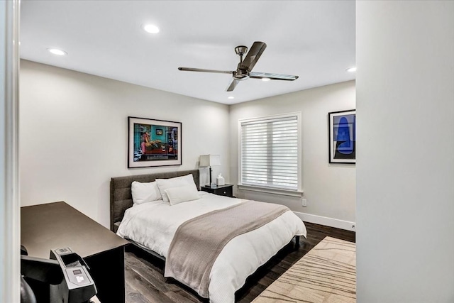 bedroom with ceiling fan, recessed lighting, dark wood-style flooring, and baseboards