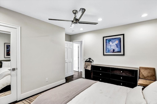 bedroom featuring recessed lighting, a ceiling fan, baseboards, and wood finished floors