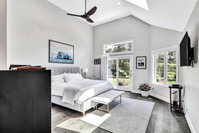 bedroom featuring a ceiling fan, baseboards, high vaulted ceiling, dark wood-type flooring, and access to outside