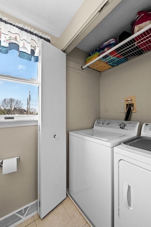 12 Jacobs Ave, Danvers, MA 01923 - clothes washing area featuring separate washer and dryer and light tile patterned floors