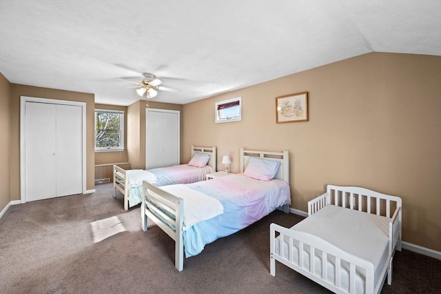 12 Jacobs Ave, Danvers, MA 01923 - bedroom with multiple windows, multiple closets, baseboards, and vaulted ceiling