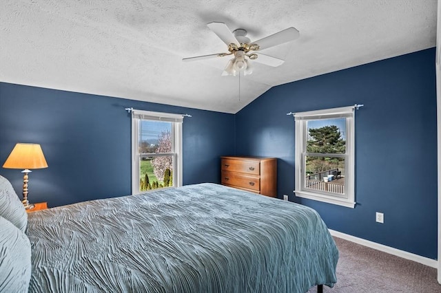 12 Jacobs Ave, Danvers, MA 01923 - bedroom with vaulted ceiling, carpet floors, a textured ceiling, baseboards, and a ceiling fan