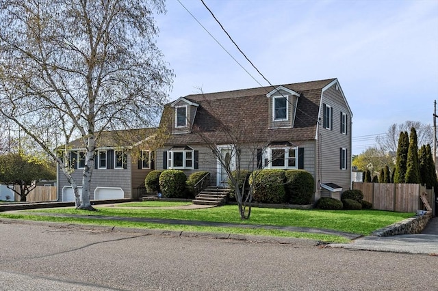 12 Jacobs Ave, Danvers, MA 01923 - dutch colonial with a shingled roof and an attached garage