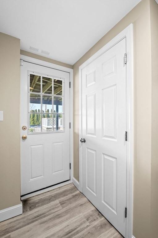12 Jacobs Ave, Danvers, MA 01923 - entryway featuring baseboards and light wood-style flooring