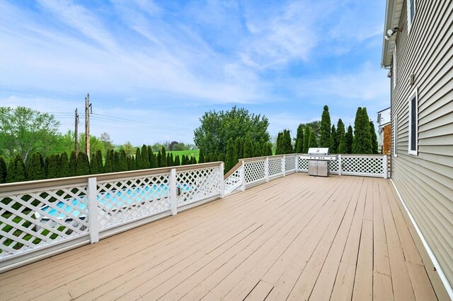 12 Jacobs Ave, Danvers, MA 01923 - wooden terrace with view of wooded area