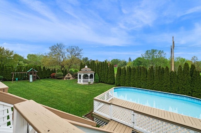 12 Jacobs Ave, Danvers, MA 01923 - swimming pool with a gazebo, a playground, and a lawn