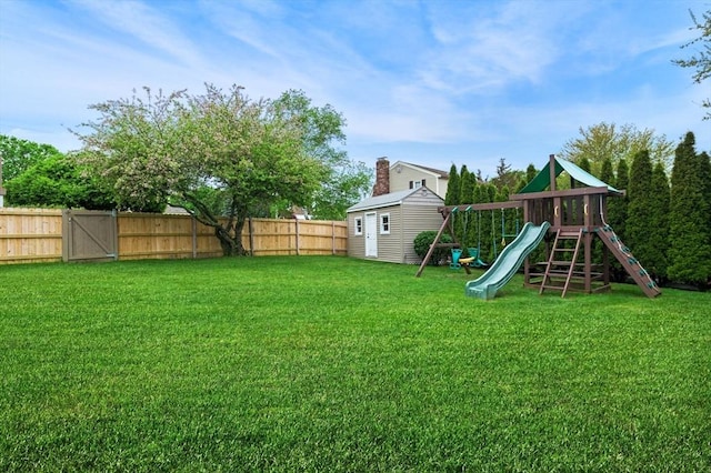 12 Jacobs Ave, Danvers, MA 01923 - view of yard featuring a playground, an outdoor structure, and a storage unit
