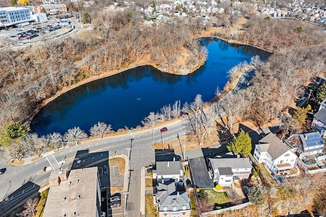 drone / aerial view with a water view