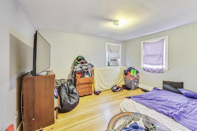 bedroom with wood-type flooring