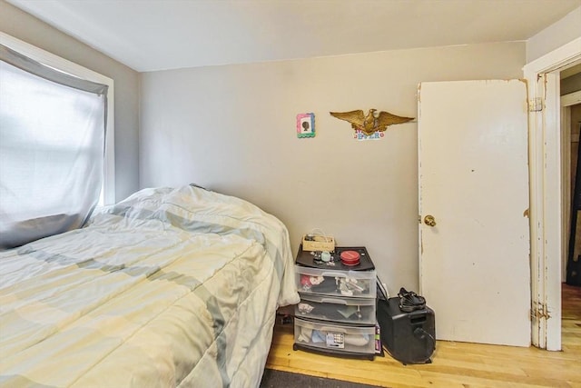 bedroom featuring hardwood / wood-style flooring