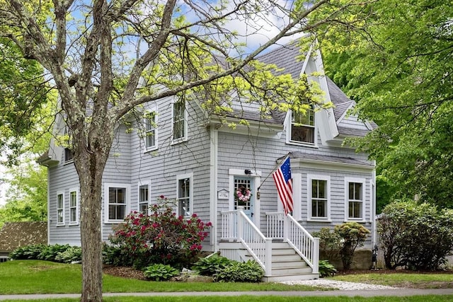 22 High St, Hingham, MA 02043 - view of front of property with roof with shingles and a front lawn