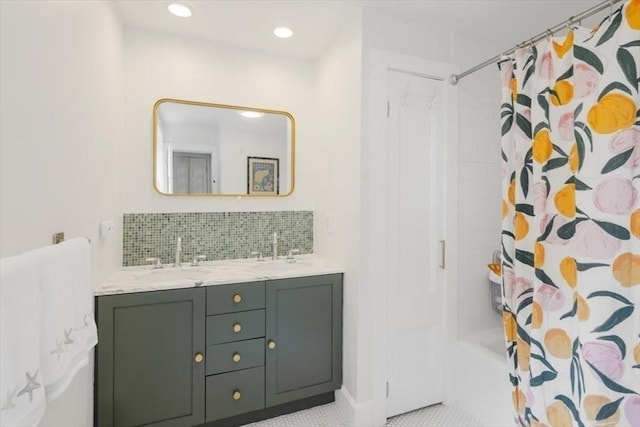 22 High St, Hingham, MA 02043 - full bathroom featuring double vanity, backsplash, shower / bath combo with shower curtain, and recessed lighting