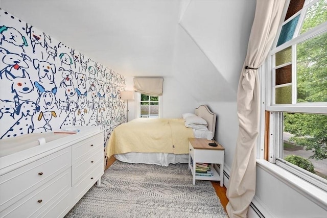 22 High St, Hingham, MA 02043 - bedroom with wood finished floors, a baseboard heating unit, and lofted ceiling
