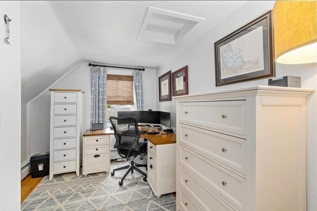 22 High St, Hingham, MA 02043 - office area with attic access, a baseboard heating unit, light wood-style flooring, and vaulted ceiling