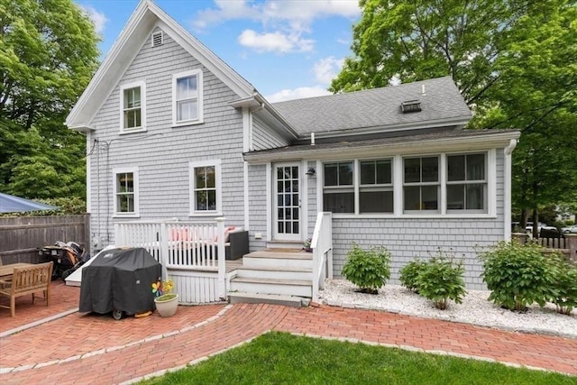 22 High St, Hingham, MA 02043 - back of property with a shingled roof, a patio area, and a wooden deck