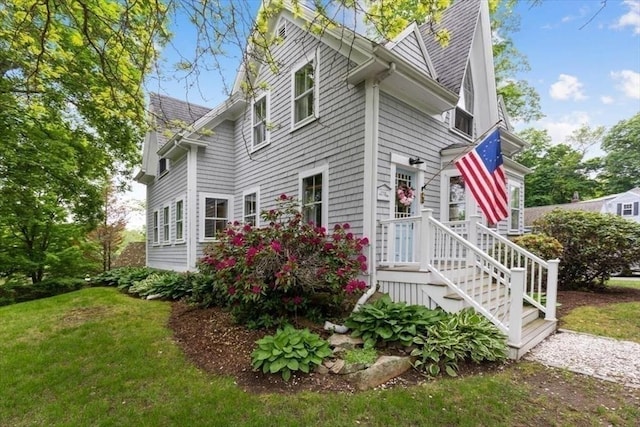 22 High St, Hingham, MA 02043 - view of side of property featuring a yard