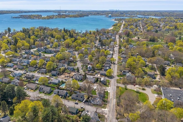 bird's eye view with a water view and a residential view