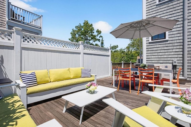 53 W Vine St Unit A, Provincetown, MA 02657 - wooden terrace featuring outdoor dining area and an outdoor living space