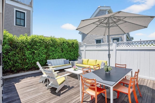 53 W Vine St Unit A, Provincetown, MA 02657 - wooden deck featuring outdoor lounge area and outdoor dining area
