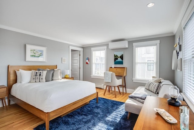 53 W Vine St Unit A, Provincetown, MA 02657 - bedroom featuring wood finished floors, crown molding, an AC wall unit, and recessed lighting