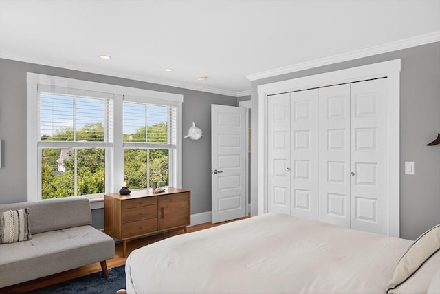 53 W Vine St Unit A, Provincetown, MA 02657 - bedroom with crown molding, a closet, wood finished floors, and recessed lighting