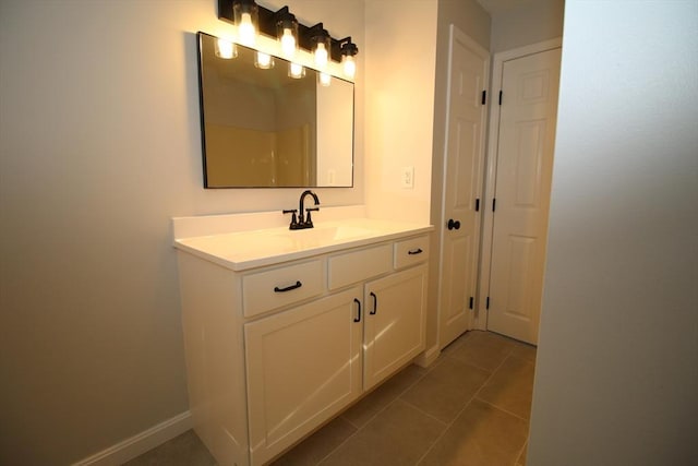 bathroom featuring tile patterned floors and vanity