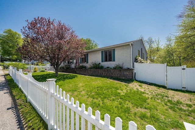view of front of home with a gate