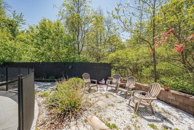 view of patio / terrace featuring fence