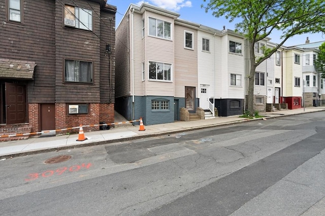 309 E Eagle St, Boston, MA 02128 - view of building exterior featuring a residential view and entry steps