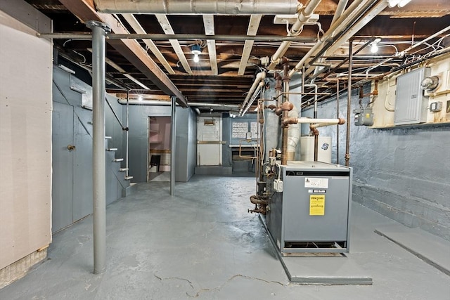 309 E Eagle St, Boston, MA 02128 - unfinished basement with stairs, gas meter, electric panel, and gas water heater