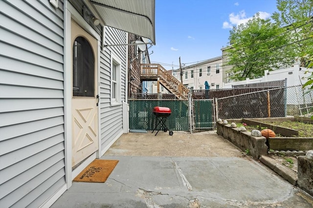 309 E Eagle St, Boston, MA 02128 - view of patio / terrace with a gate and stairway