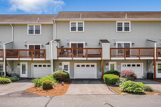 47 Patrick Rd Unit 47, Tewksbury, MA 01876 - back of property featuring an attached garage and driveway