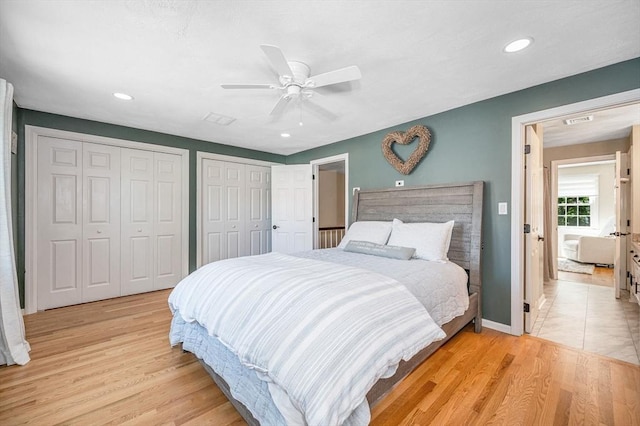 47 Patrick Rd Unit 47, Tewksbury, MA 01876 - bedroom featuring light wood finished floors, two closets, recessed lighting, a ceiling fan, and baseboards
