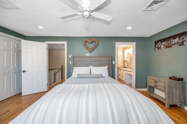 47 Patrick Rd Unit 47, Tewksbury, MA 01876 - bedroom featuring wood finished floors, recessed lighting, ensuite bathroom, and ceiling fan