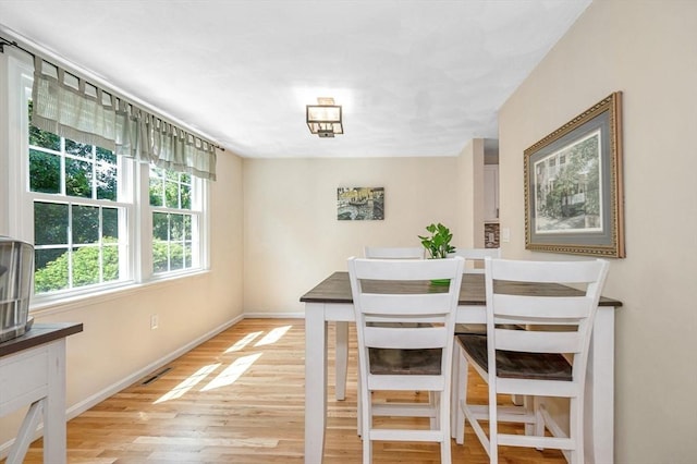 47 Patrick Rd Unit 47, Tewksbury, MA 01876 - dining area featuring light wood-type flooring and baseboards