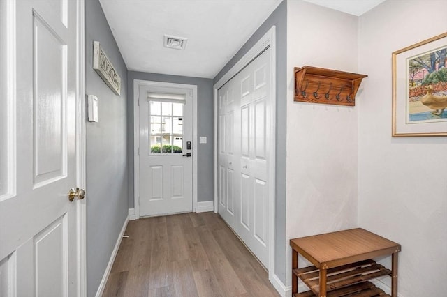 47 Patrick Rd Unit 47, Tewksbury, MA 01876 - doorway with wood finished floors and baseboards