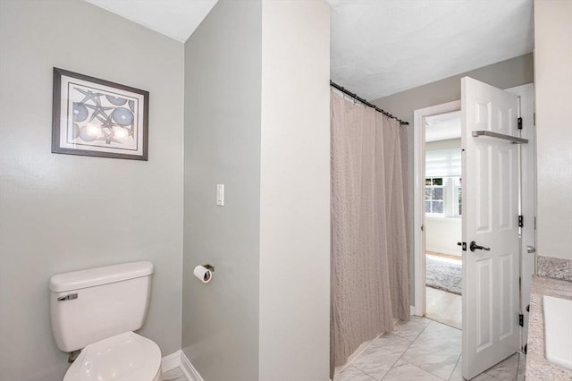 47 Patrick Rd Unit 47, Tewksbury, MA 01876 - full bathroom with marble finish flooring, toilet, and a shower with curtain