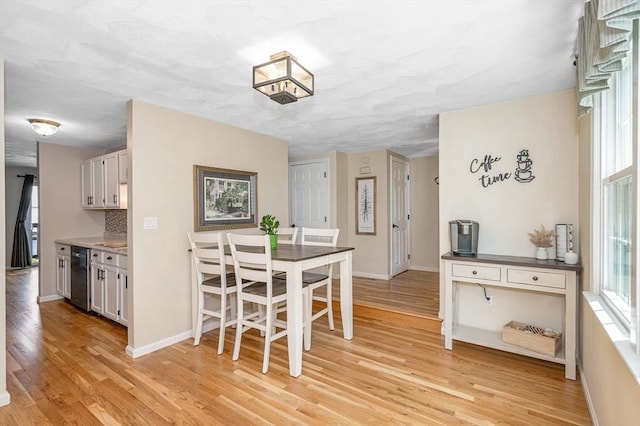 47 Patrick Rd Unit 47, Tewksbury, MA 01876 - dining area with light wood-style flooring and baseboards