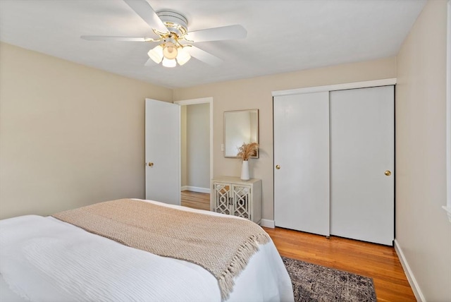 11 Anniversary Way, Billerica, MA 01821 - bedroom with wood finished floors, a closet, and a ceiling fan