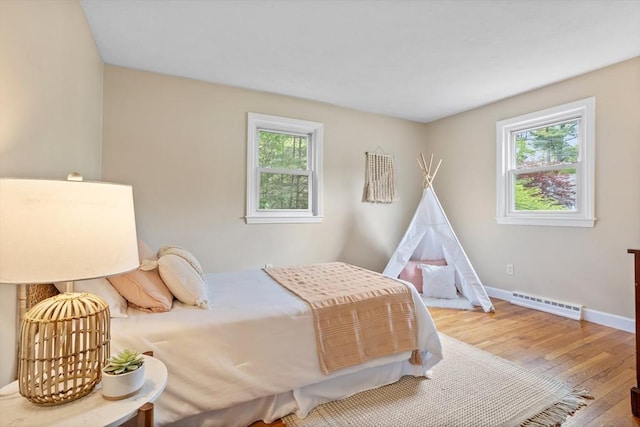 11 Anniversary Way, Billerica, MA 01821 - bedroom with multiple windows and wood finished floors