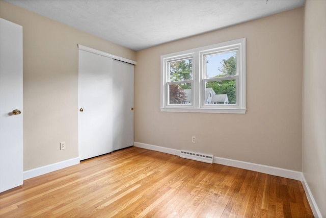 11 Anniversary Way, Billerica, MA 01821 - unfurnished bedroom with light wood-type flooring and a closet