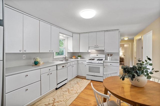 11 Anniversary Way, Billerica, MA 01821 - kitchen featuring white appliances, under cabinet range hood, white cabinets, and light countertops