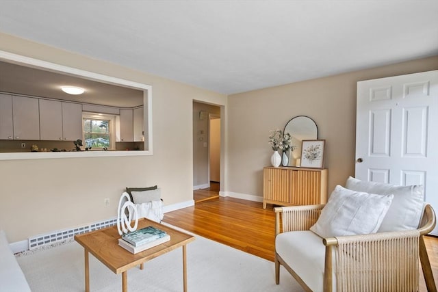 11 Anniversary Way, Billerica, MA 01821 - living area with baseboard heating and wood finished floors